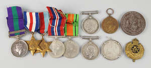 
	
		A group of 10 medals and a cap badge, comprising: General Service medal 1918-62, bar...