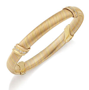 
	
		Cartier, diamond bangle, by Cartier, of twisted three tone design, accented with...
