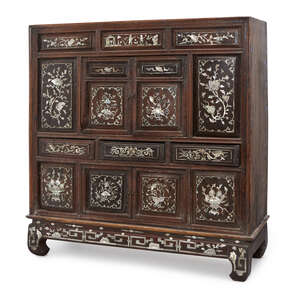 
	
		A Chinese hardwood and mother-of-pearl inlaid table top cabinet, 19th century, with...