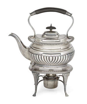 
	
		An Edwardian silver tea kettle and stand, London, c.1903, Goldsmiths & Silversmiths Co...