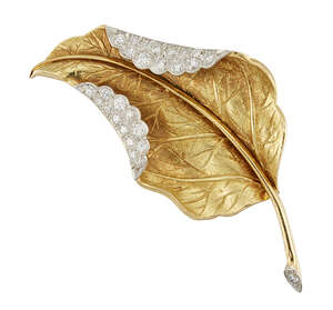 An 18ct gold diamond brooch, designed as a stylised leaf with pave diamond folds, diamond set stem and naturalistic decoration, London hallmarks, 1963, 6.5cm l
