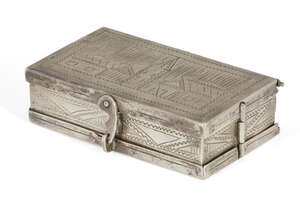 
	
		A travelling Hanukkah lamp in the form of a book, bearing spurious Russian silver marks...