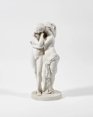 A Hertwig & Co. Katzhutte parian figural group, second quarter 20th century, impressed mark to the underside, the scantily clad figures embracing, on a circula