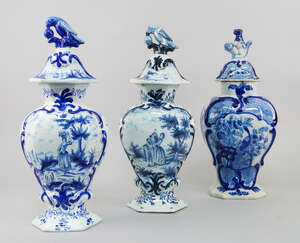 
	
		Two Delft vases and covers, in the 18th century taste, 20th century, decorated with...