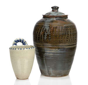 
	
		Michael Cardew (1901-1983), a Volta Pottery wall pocket 
		1945-48, impressed seals to...