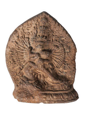 
	
		A Tibetan terracotta votive plaque of Yamantaka, 18th century, with consort, and flaming...