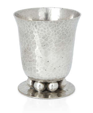 
	
		Jean Despres (1889-1990), 
		 
		Beaker vase, circa 1930s, 
		Hammered Silver plate,...