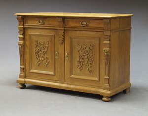 
	
		An oak buffet, late 19th century / early 20th Century, possibly German, the rectangular...