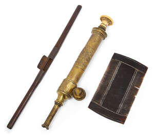 
	
		A horn comb, 18th/19th century, 10.2cm long, together with a wood and steel spoke shave,...