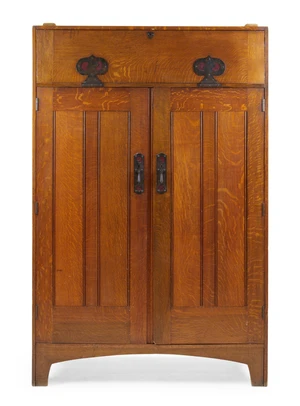 An Arts & Crafts oak wardrobe, by Heal & Son, first quarter 20th century, with fall front...
