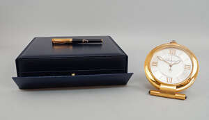 
	
		A presentation compendium travelling quartz alarm clock and pen, by Chopard, the clock ...