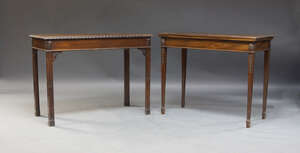 
	
		A George III style mahogany fold over card table, first half 20th Century, the...