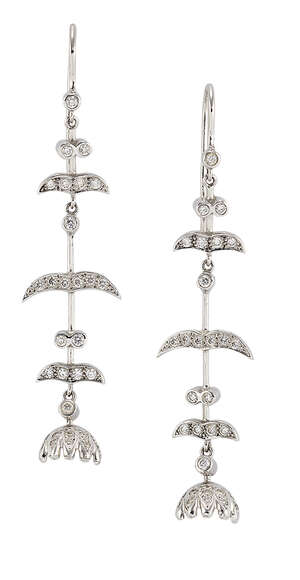 
	
		A pair of diamond drop earrings, the flower cusps (for pearls) suspended from articulated...