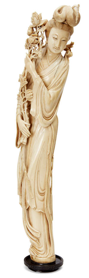 
	
		A large Chinese ivory tusk carving, 19th century, carved as The Queen Mother of The West...