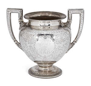 
	
		An engraved Victorian silver sugar bowl, London, c.1871, Thomas White, designed as a...