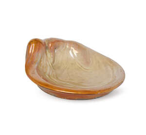 
	
		Zsolnay, an Eosin glazed figural vide poche 
		c.1900, raised spire roundel mark
		
