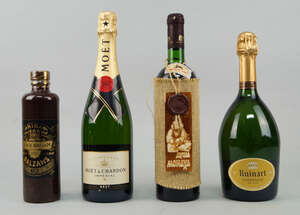 
	
		A bottle of Moet et Chandon champagne, together with a bottle of Ruinart champagne, a...
