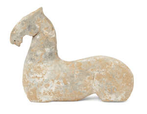 A Chinese grey stoneware fragmentary model of a horse, Han dynasty, traces of red painted saddle, 28cm long