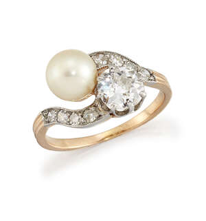 
	
		A late 19th early 20th century  diamond and pearl crossover ring, the old-brilliant-cut...