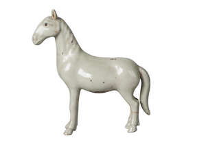 A Chinese porcelain celadon glazed horse, Qing dynasty, 18th century, standing four square, unglazed to oval patch on belly, 16.5cm high