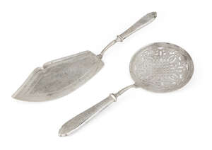 
	
		A pair of fish servers, white metal (unmarked), both chased with patterns to handles, the...