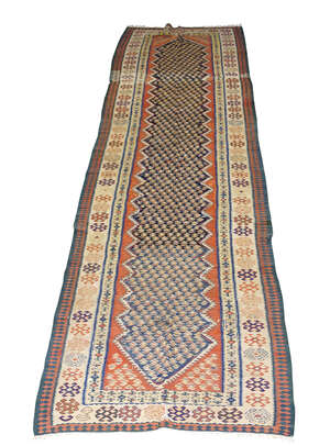 
	
		A North West Persian Soumak runner, mid to late 20th century, the deep blue field with...