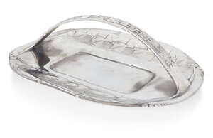 
	
		Probably Archibald Knox (1864-1933) for Liberty & Co, 
		 
		Tudric cake basket, model...