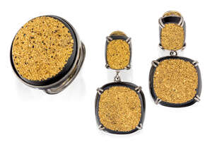 
	
		A pair of earrings and a ring, set with yellow coloured compacted crystal effect...