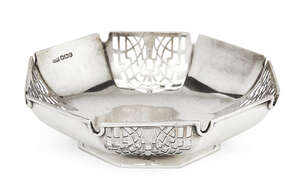 A pierced silver bonbon dish, Sheffield, c.1938, Harrison Brothers & Howson, of octagonal form with four pierced domed sections, the dish raised on a low octag