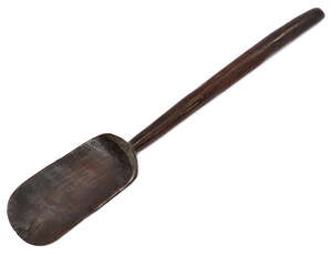 
	
		A large African hardwood spatula, 57cm long 

	

