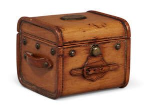 
	
		An unusual satinwood treen inkwell, 19th century, in the form of a miniature cabin trunk,...
