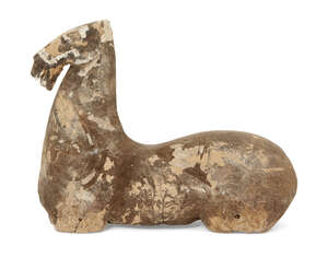 A Chinese grey stoneware fragmentary model of a horse, Han dynasty, traces of white painted bridle and saddle, 28cm long