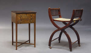 
	
		An Edwardian mahogany folding piano stool, with upholstered seat on x-shaped supports,...