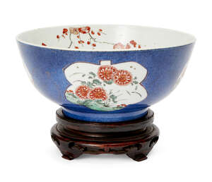 
	
		A Chinese porcelain bowl, Kangxi period, painted in famille verte enamels with panels of...