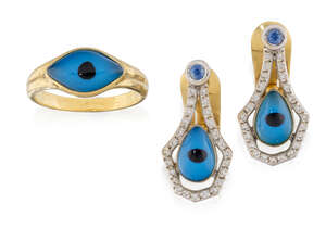 
	
		An 'evil eye' ring and pair of earrings, the ring with single glass 'evil eye' to a...