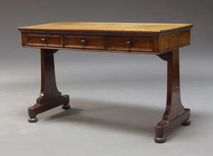 
	
		A William IV mahogany library table, the rectangular top, above three frieze drawers on...