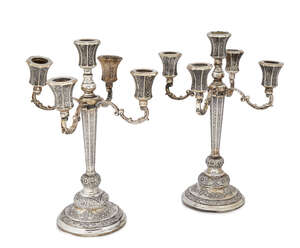 
	
		A pair of Greek 900 fineness silver candelabra, with four scrolling branches above...