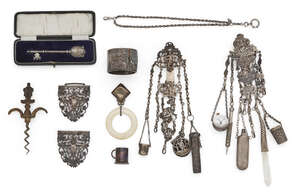 
	
		A Victorian silver chatelaine, Charles Boyton, London 1888, of typical form, decorated...
