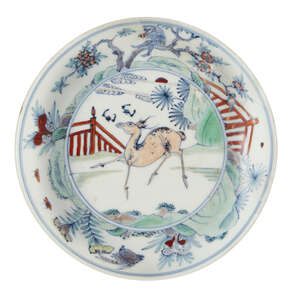 
	
		A Chinese porcelain doucai dish, Kangxi period, painted in underglaze blue and enamels...
