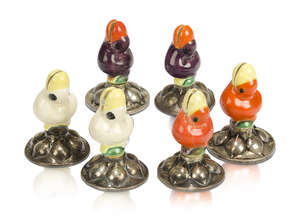 German, a harlequin set of six silver and ceramic menu holders
c.1920, all stamped '800' with...