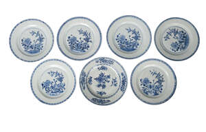 
	
		Seven Chinese export porcelain plates, 18th century, each painted in underglaze blue with...