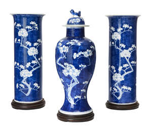 
	
		A pair of Chinese porcelain large sleeve vases and a baluster vase and cover, late 19th...
