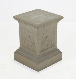 An Art Nouveau composition stone garden plinth, with stylised floral panels, 43cm high, 32cm...