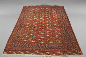 
	
		A Tekke Turkmen carpet, early to mid 20th Century, with five rows of guls in red field,...