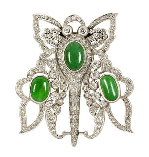 
	
		A Jadeite jade and diamond clip brooch, modelled as a stylised butterfly set with three...