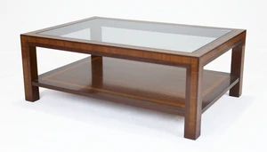 A modern satinwood crossbanded mahogany two-tier coffee table, 45cm high, 120.5cm wide, 81cm...