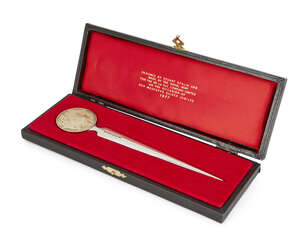 
	
		A parcel gilt silver letter opener by Stuart Devlin, London, 1977, in signed, fitted...