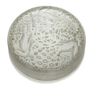 
	
		René Lalique (1860-1945), a small clear and frosted glass circular box and cover 
		