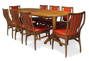 
	
		Andrew J. Milne (British), a rosewood veneered extending dining table and eight dining...