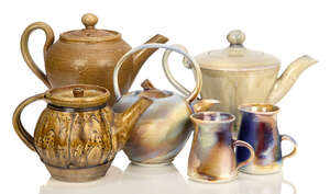 
	
		Richard Ballantyne (British), a teapot and two mugs 
		c.2000, mugs signed 
		A...